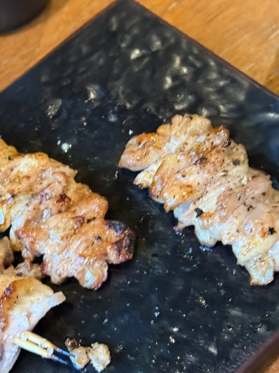A yakitori skewer served midway through the course