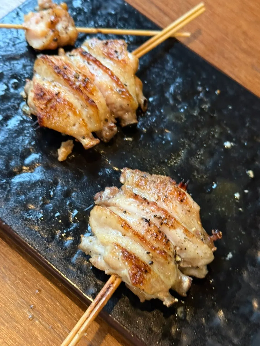 A plate from the yakitori course served in sequence