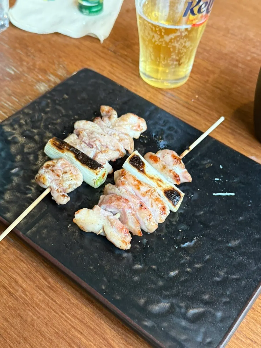 Yakitori and drinks on the izakaya table