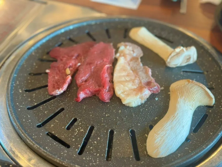 Horse meat grilling on the pan