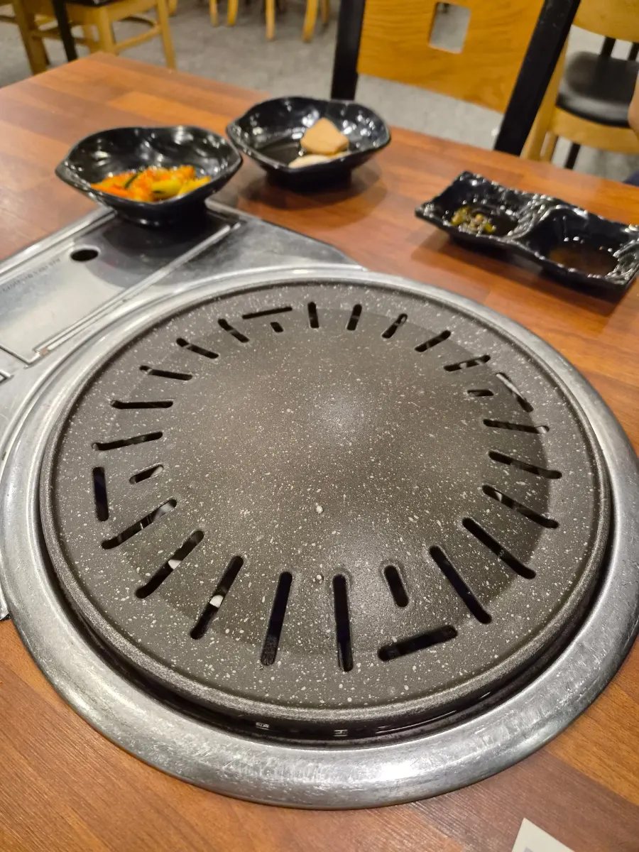 Grill pan set up on the table for horse meat grilling