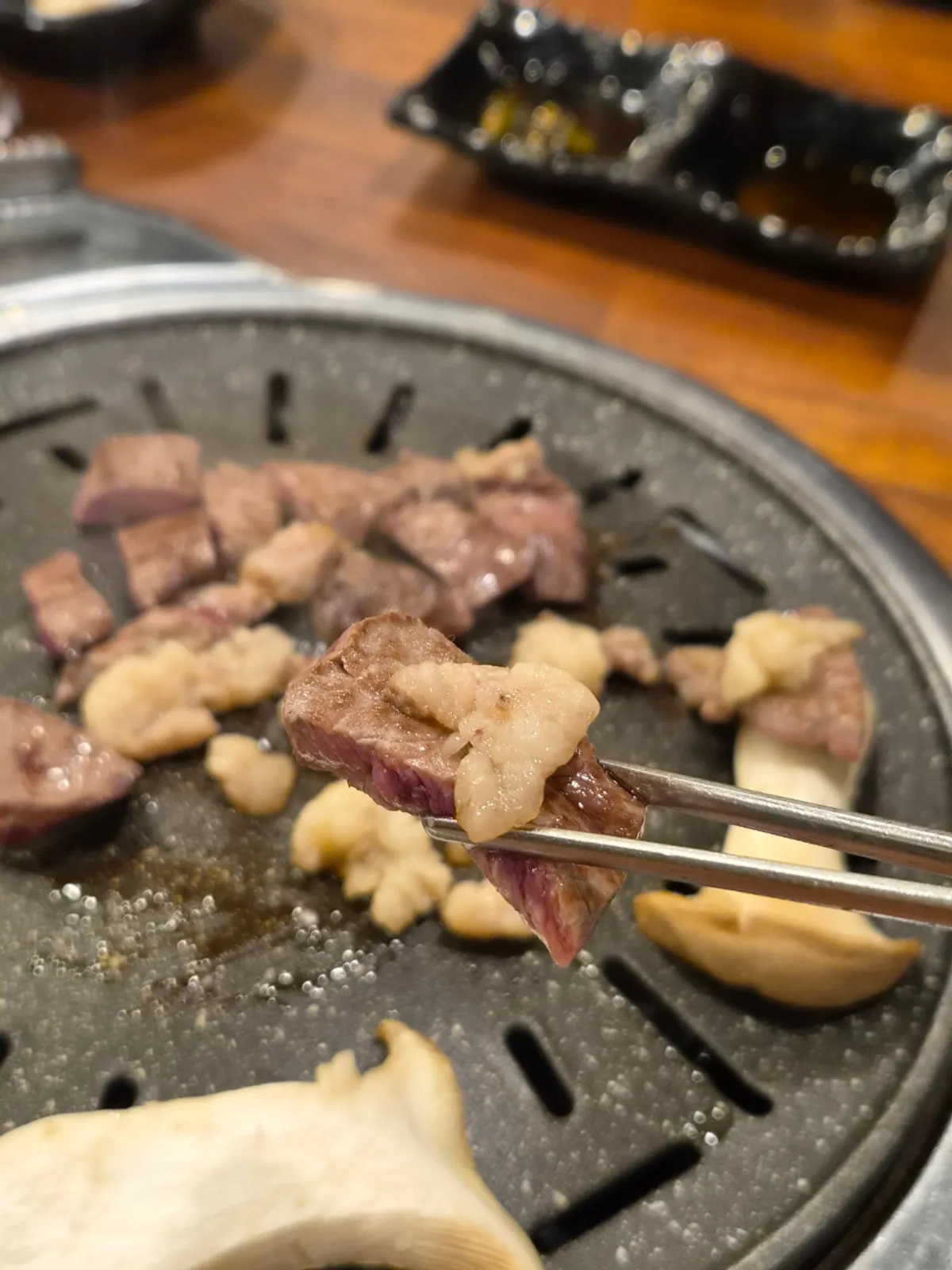 Perfectly grilled horse meat set on top of mushrooms