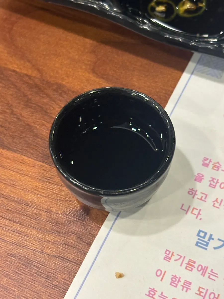 Warm horse extract drink served at the start of the course