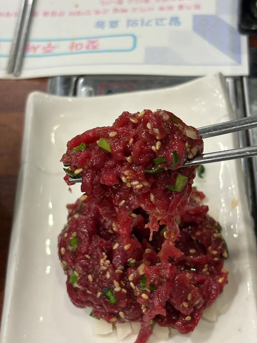 Close-up of horse yukhoe mixed with pear and seasoning