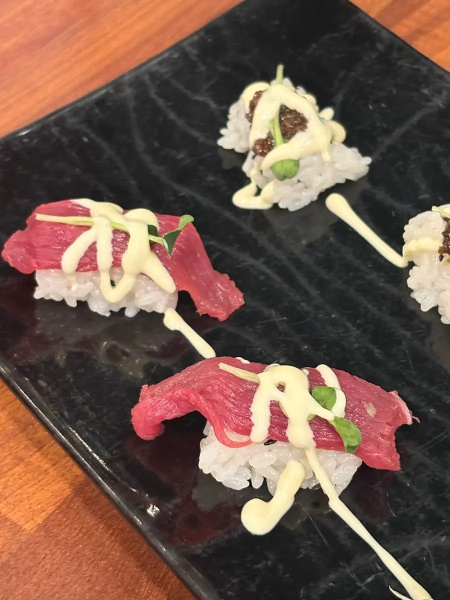 A plate of horse sushi pieces