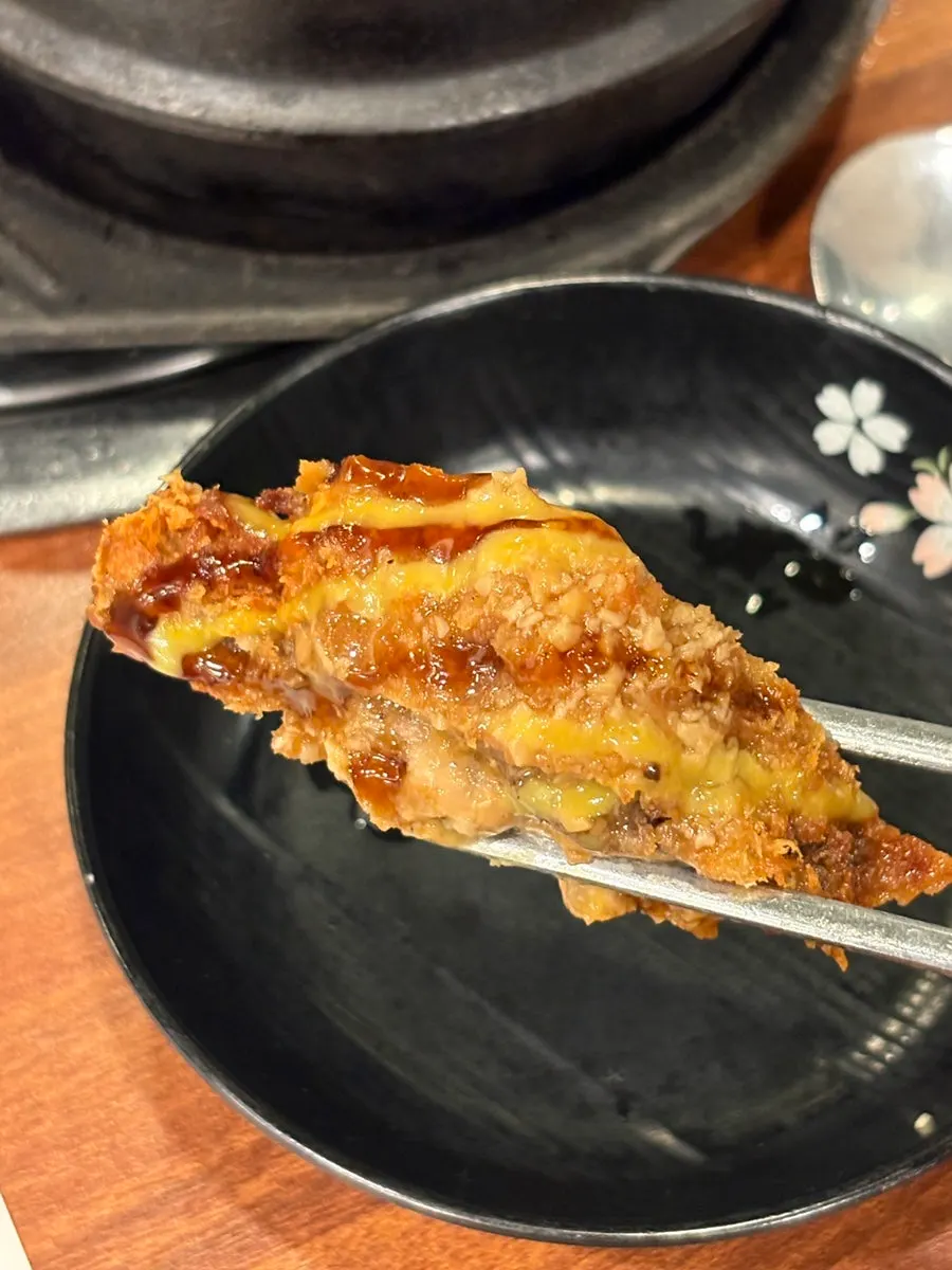 Cross-section of the crispy-battered makkaseu