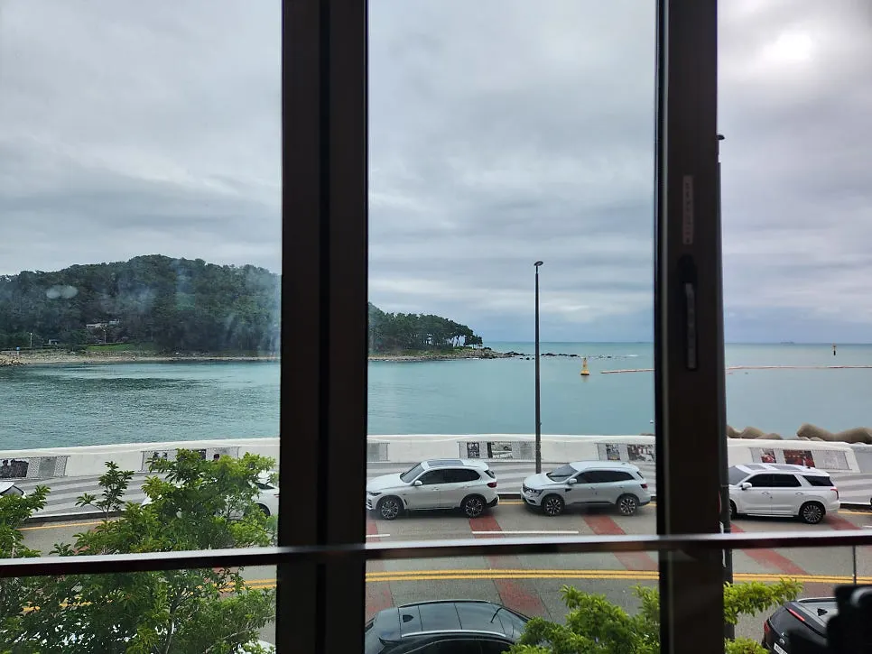 Sea view seen through the window beside the table