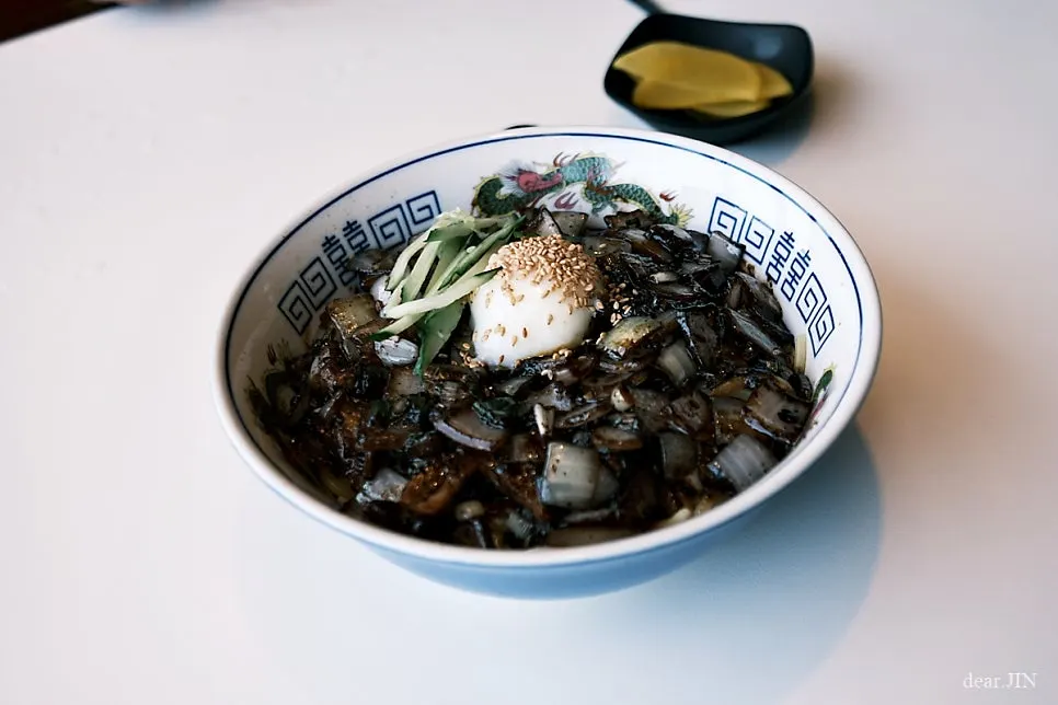 Ganjajang topped with a poached egg