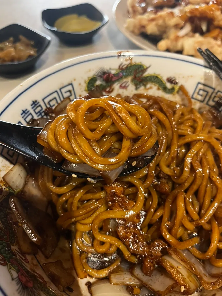 Mixed ganjajang noodles with thick chunks of meat