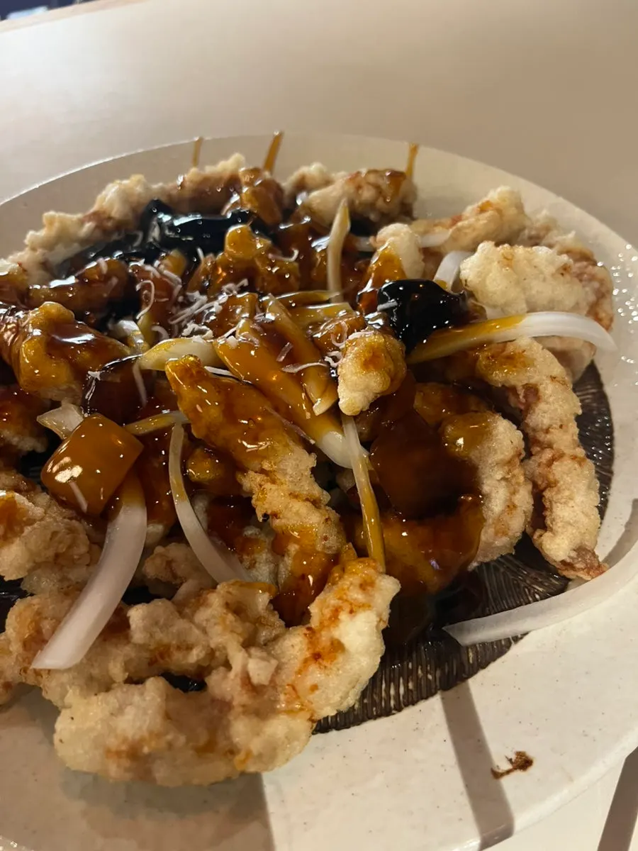 Small black vinegar tenderloin tangsuyuk topped with sauce