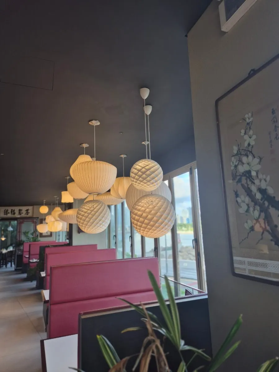 A corner of the restaurant with European-style furniture and lighting