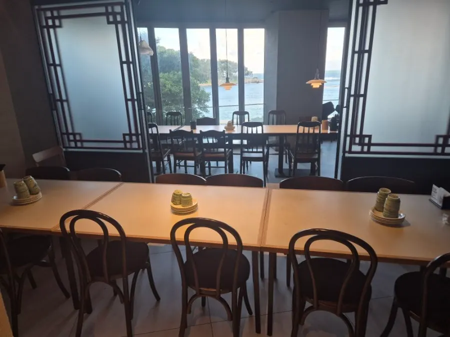 Wide-spaced table seating in the restaurant hall