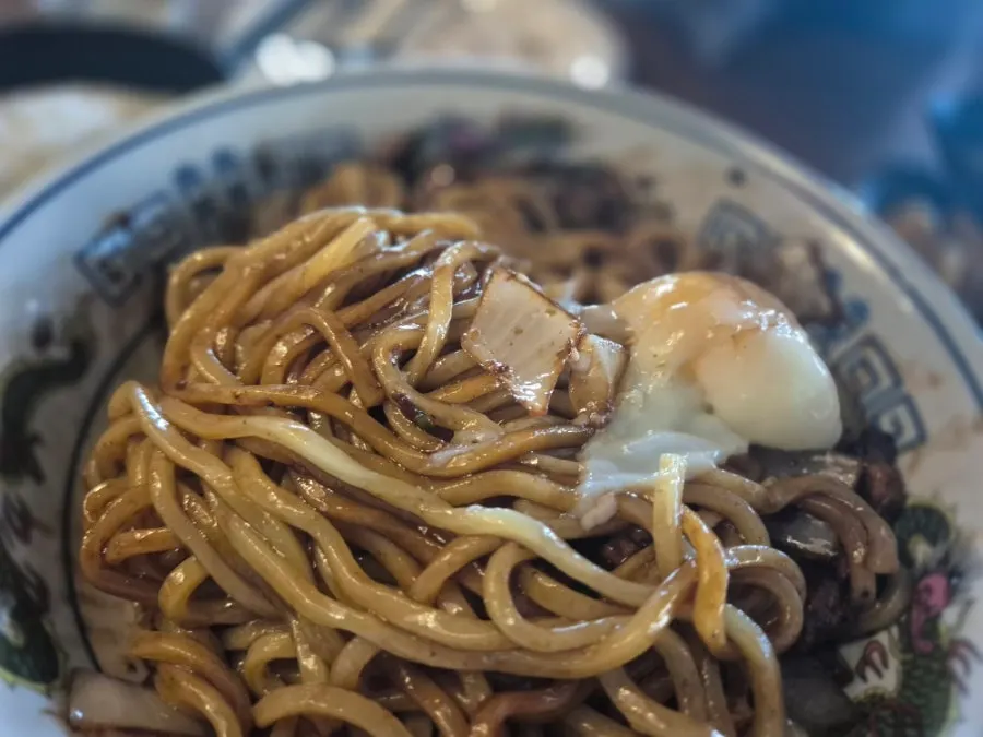 A bowl of ganjajang topped with rich sauce
