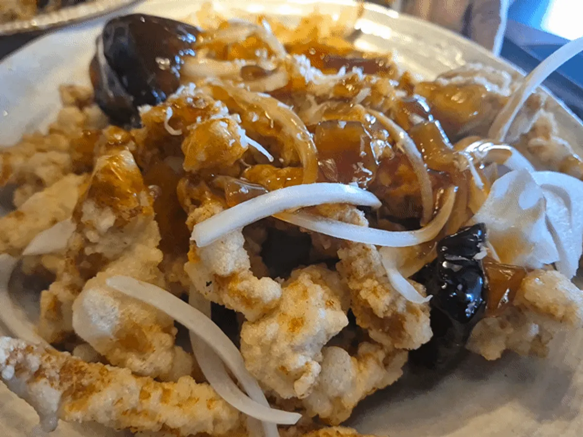 Picking up a piece of tangsuyuk