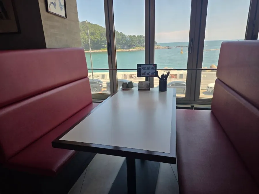 Interior of the restaurant entrance right after opening the door