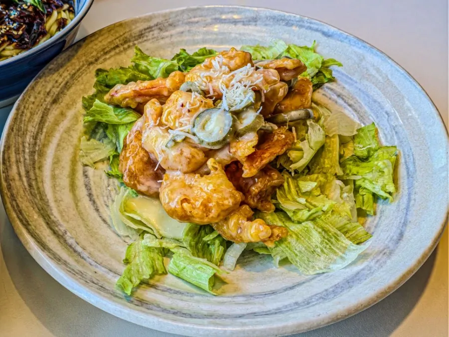 Plate of jalapeño cream shrimp ordered as a cooked dish