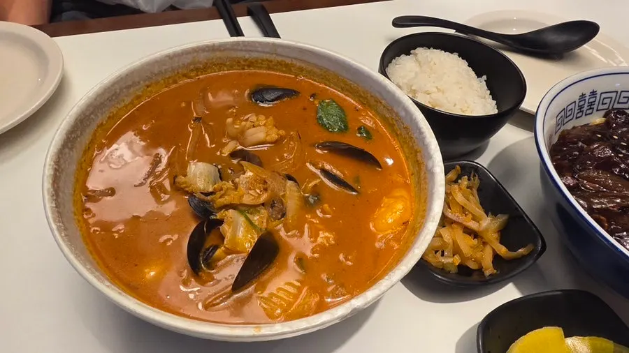 Seafood jjamppong rice served with rice on the side