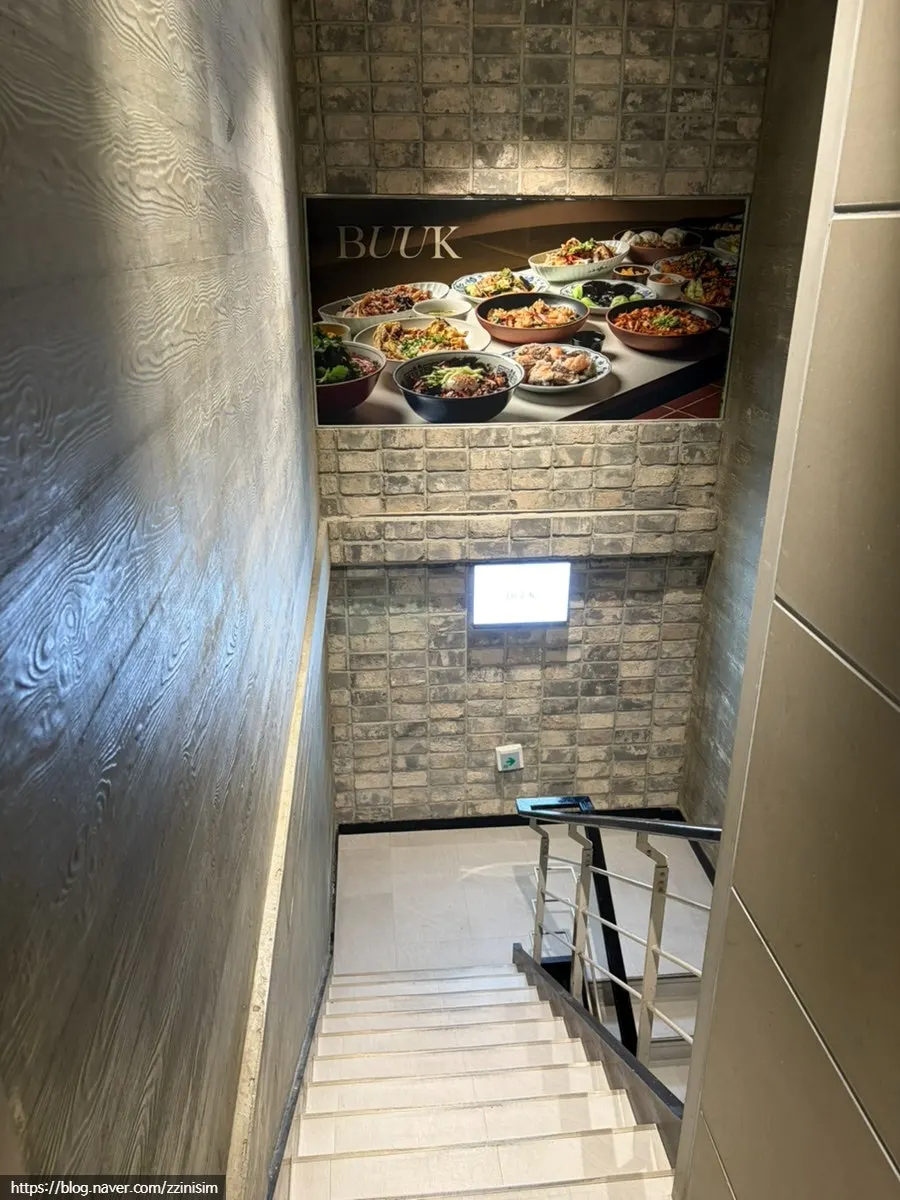 Interior seen through the glass doors with the ocean view outside