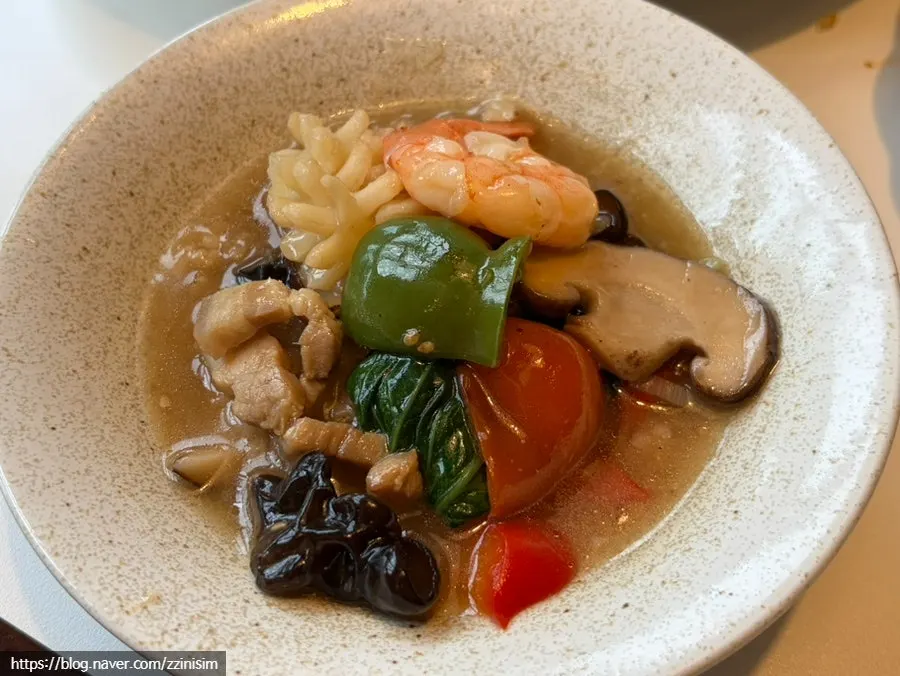 Nurungji and thick sauce served on a small plate