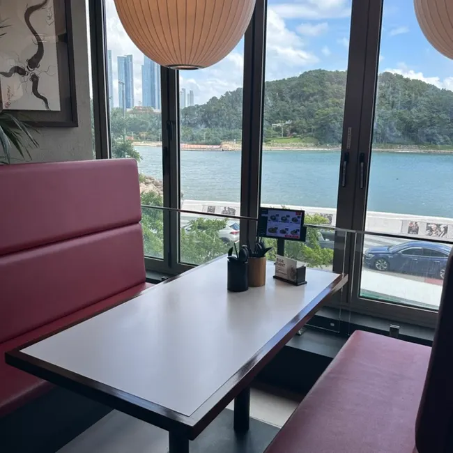 View of the Haeundae sea and Dongbaekseom from the window seats