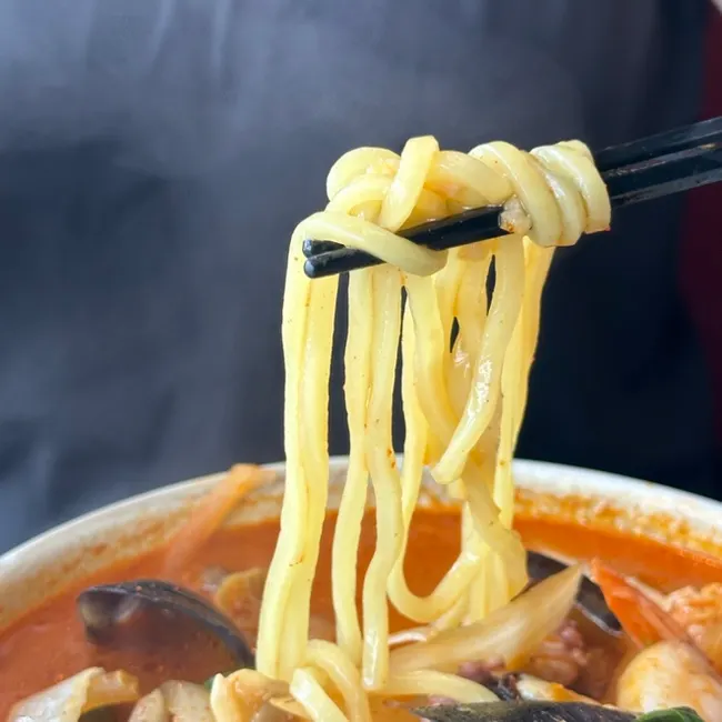 Jjamppong noodles soaked in spicy broth