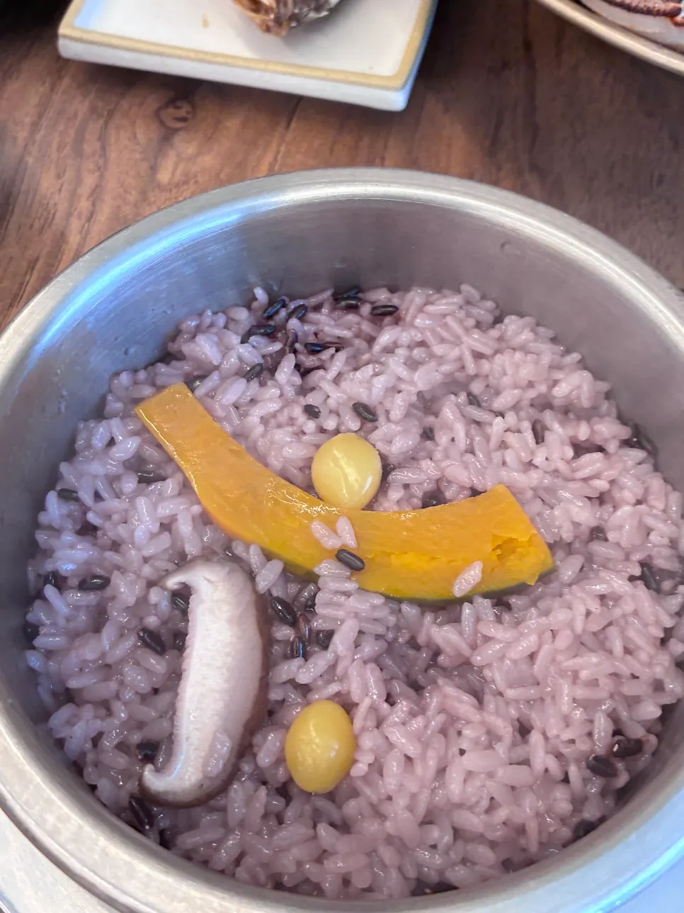 Nutritious pot rice with a bowl scooped out