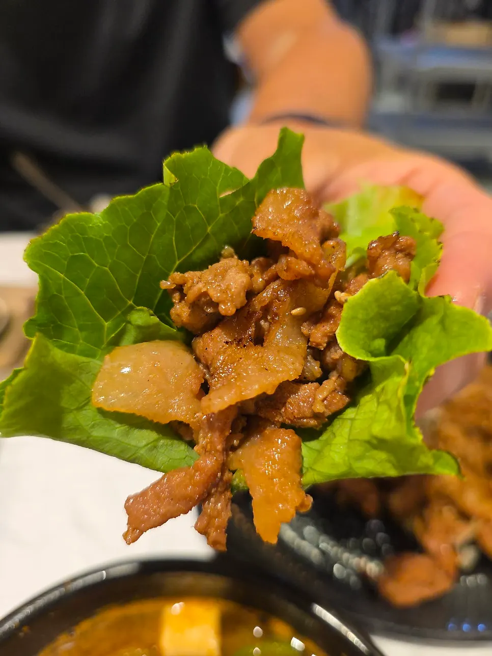 Grilled bulgogi and side dishes served at Yun Sikdang