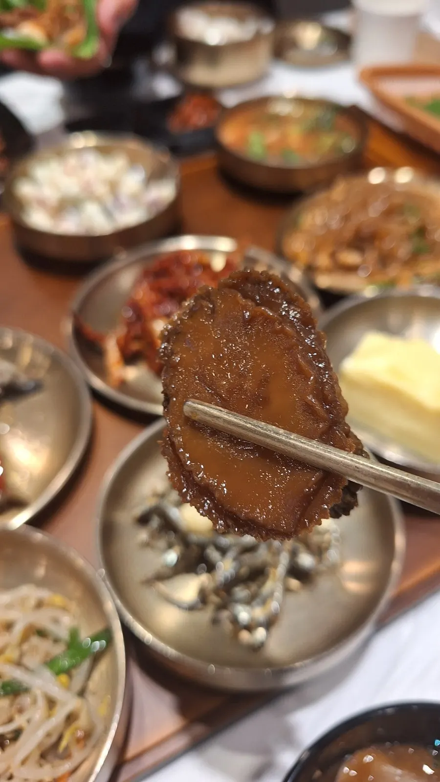 Close-up of bite-sized braised abalone
