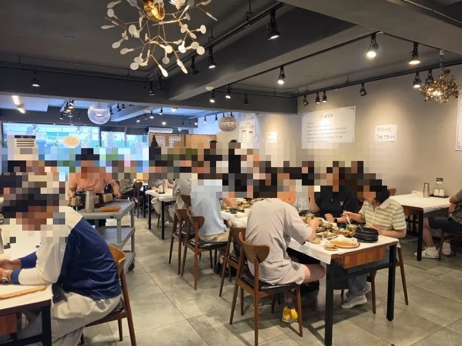 Interior of Yun Sikdang being cleared and reset quickly