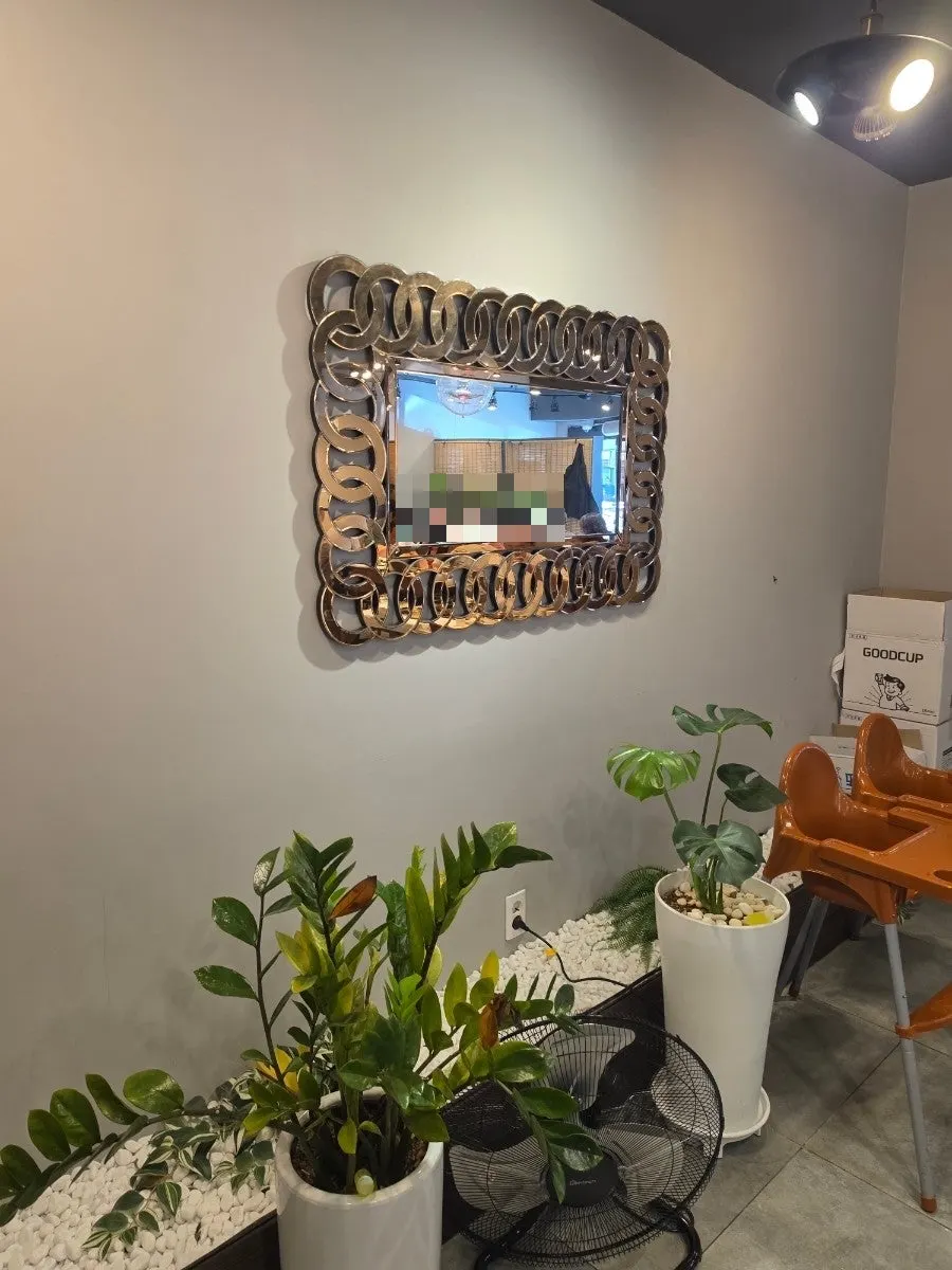 Mirror and baby chair set up in a corner of Yun Sikdang