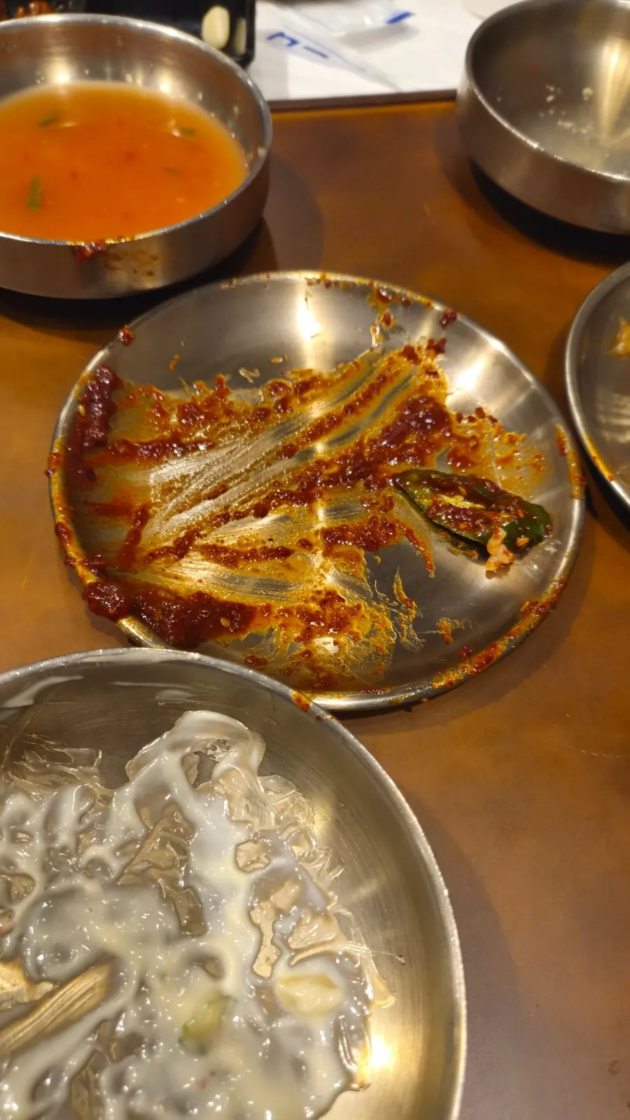 Seasoned crab sauce spread on a lettuce leaf