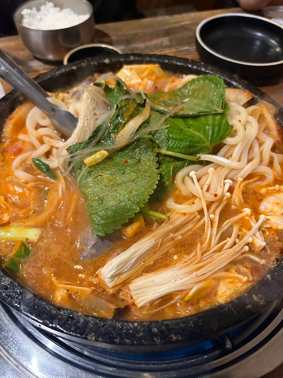 Gopchang jeongol broth bubbling away