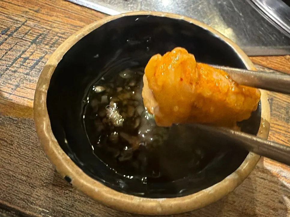 A full spread of gopchang jeongol eaten with rice