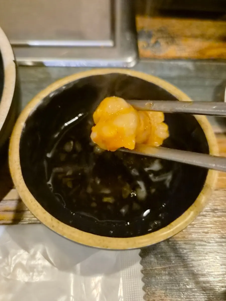 Tripe pulled from the simmered hotpot