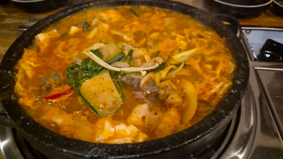 A hearty spread with sundae and sujebi added to the hotpot