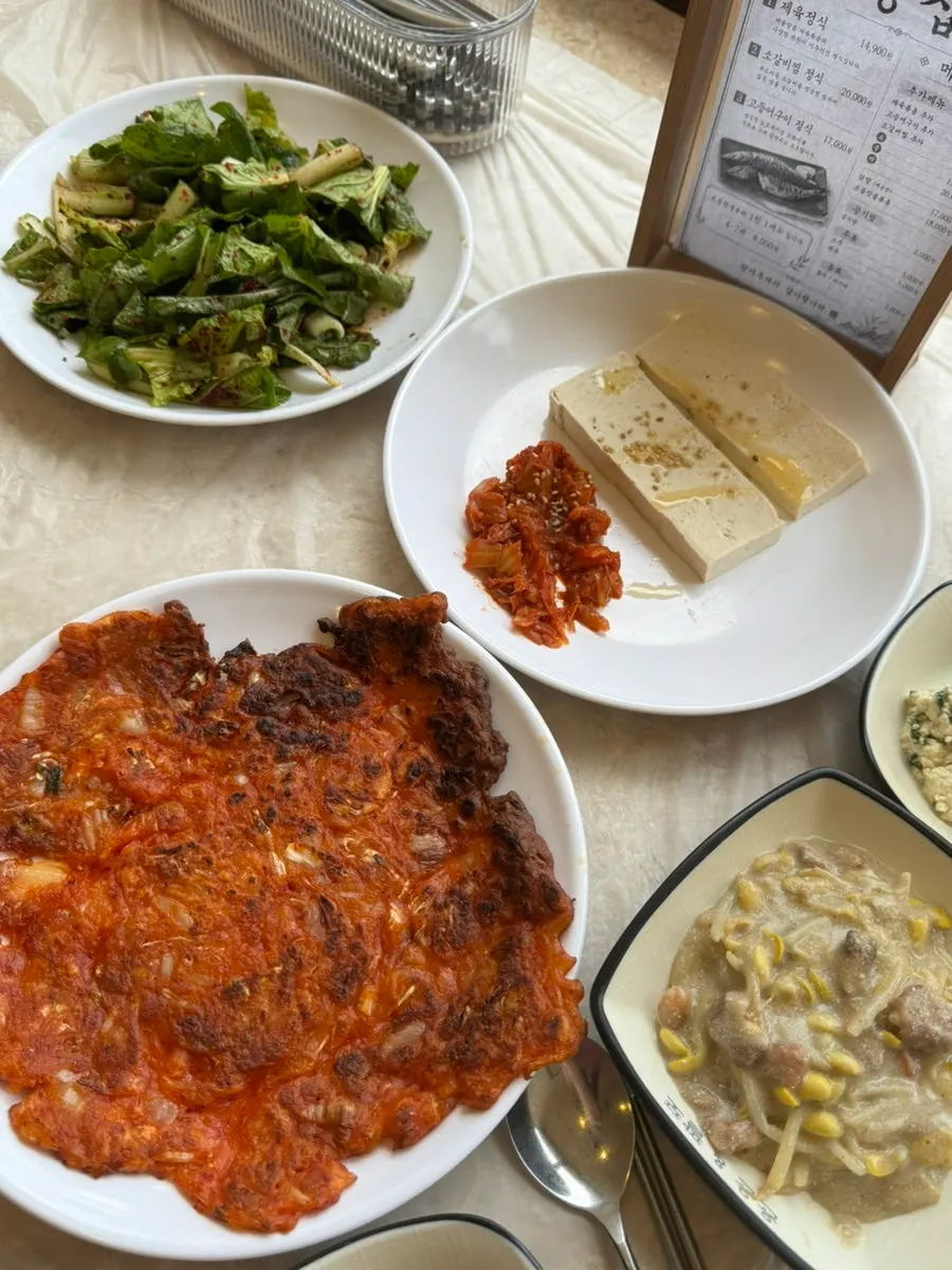 Various side dishes laid out on the table