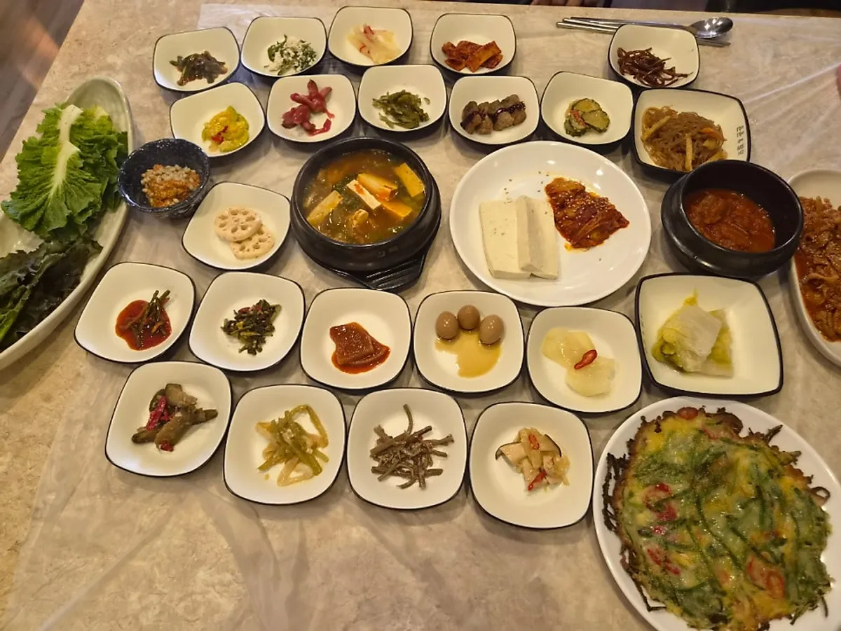 Ssambap set table filled with side dishes