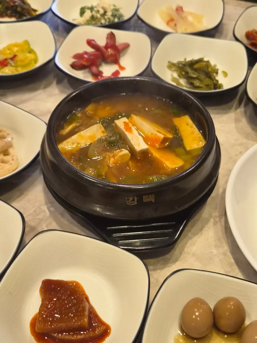 Tofu doenjang jjigae served in a stone pot