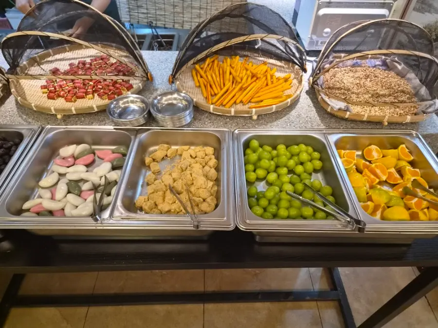 Fruit for dessert prepared at the self-serve bar