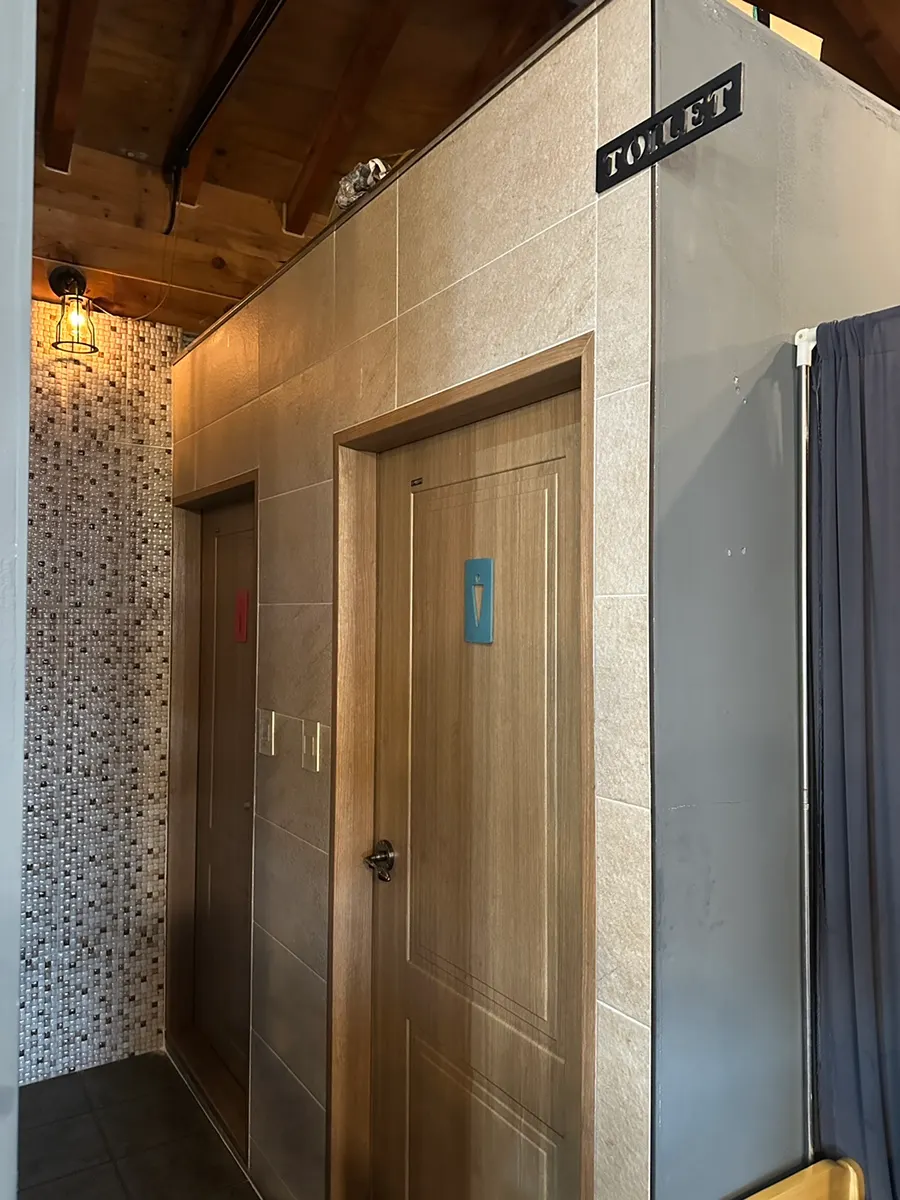 High-ceilinged hall seating divided by partitions
