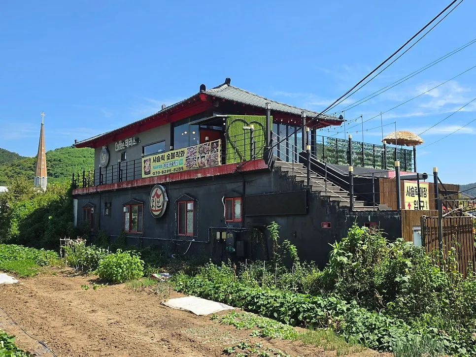 Exterior of Shashlik Masan Branch building visible from the road