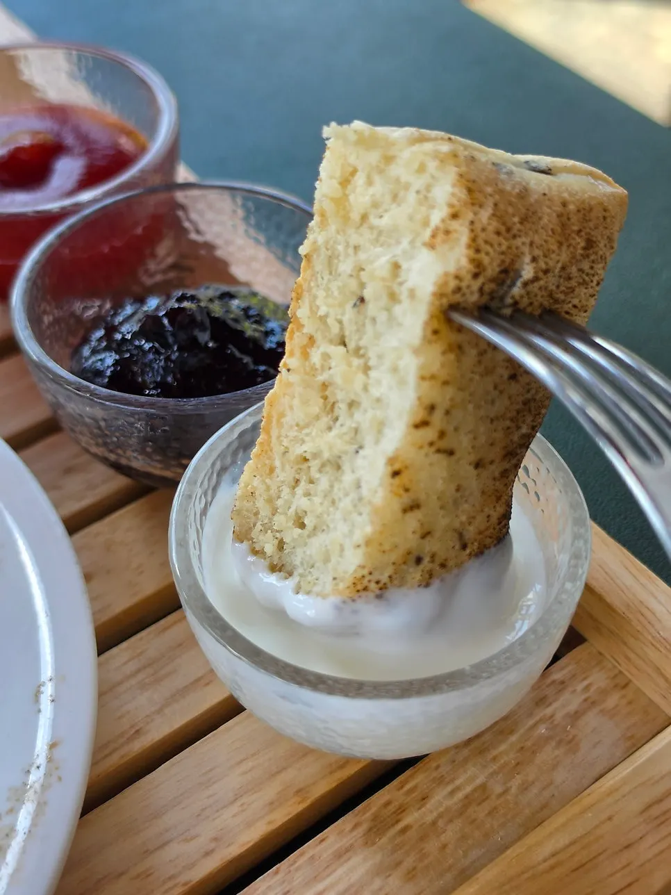 Olive ciabatta served with yogurt sauce