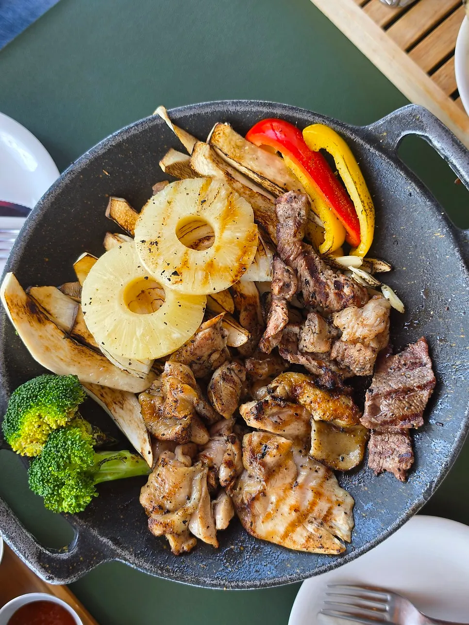 Special shashlik plated with generous vegetable garnish