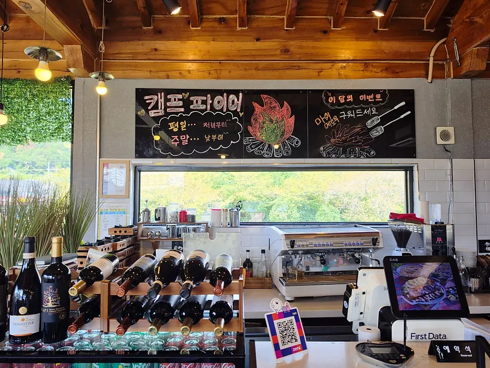 Interior of Shashlik Masan Branch with floor-to-ceiling windows showing natural scenery