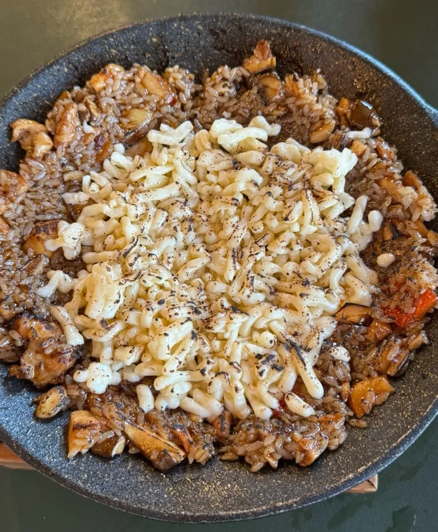 Shashlik fried rice topped with plenty of cheese