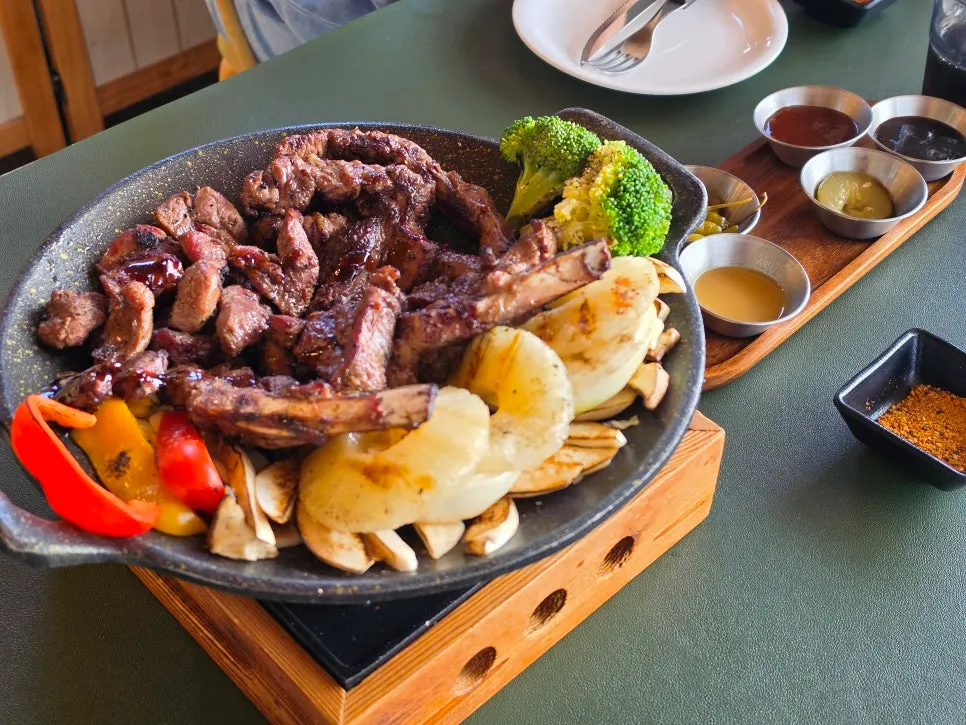 Lamb assortment charcoal shashlik served on the table