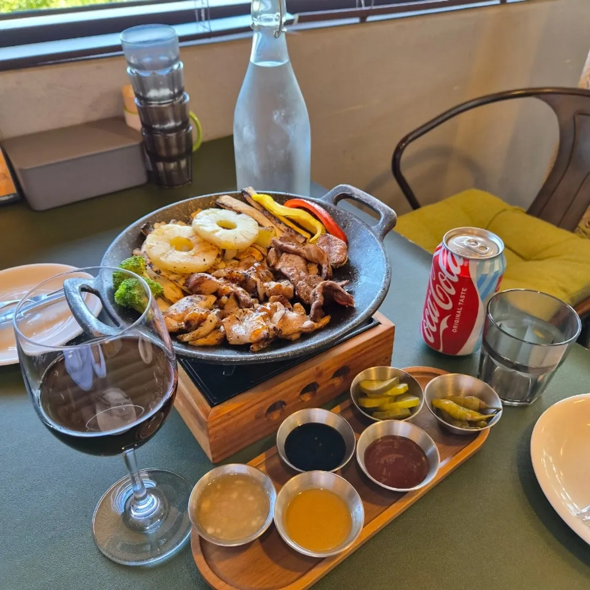 A full plate of special shashlik with meat and vegetables