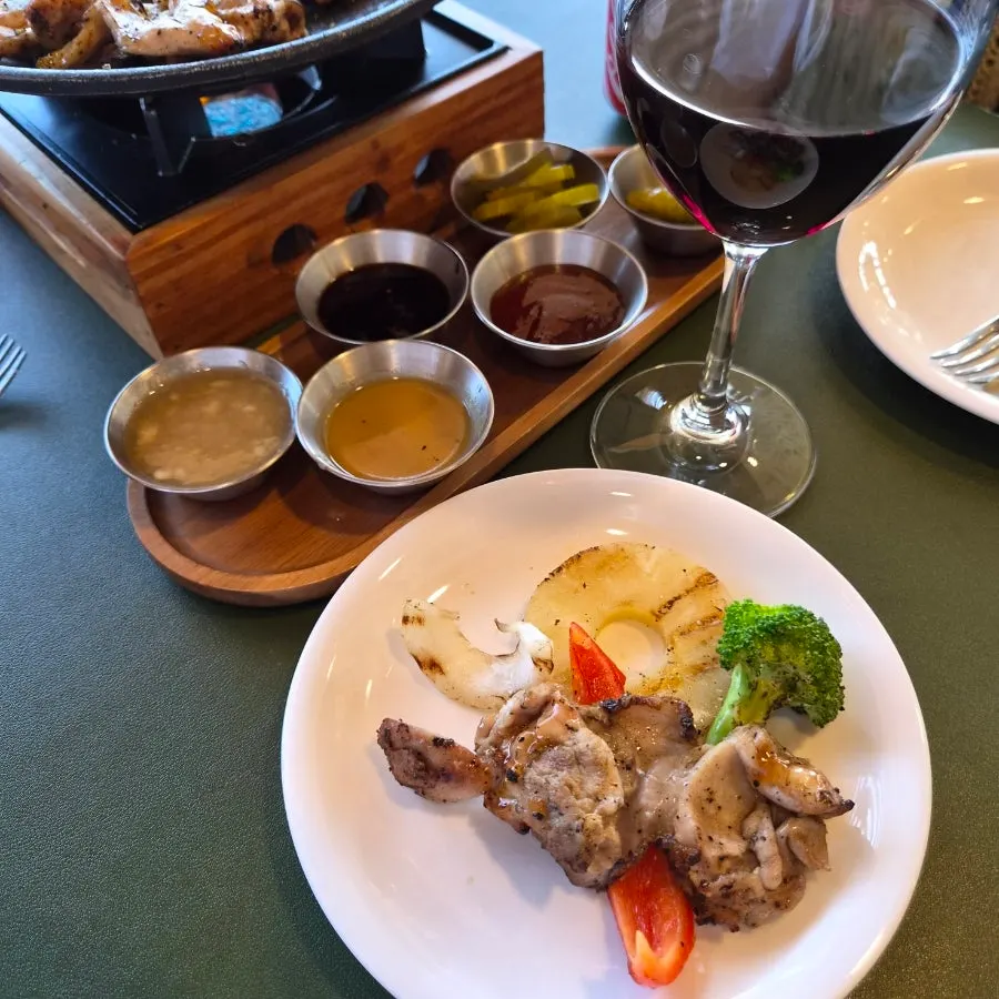 Meat and vegetables plated on a small dish