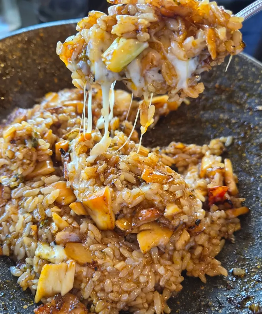 Spicy shashlik fried rice topped with cheese