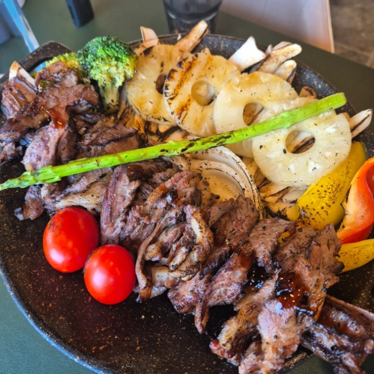Thick-cut prime rib steak served at the table